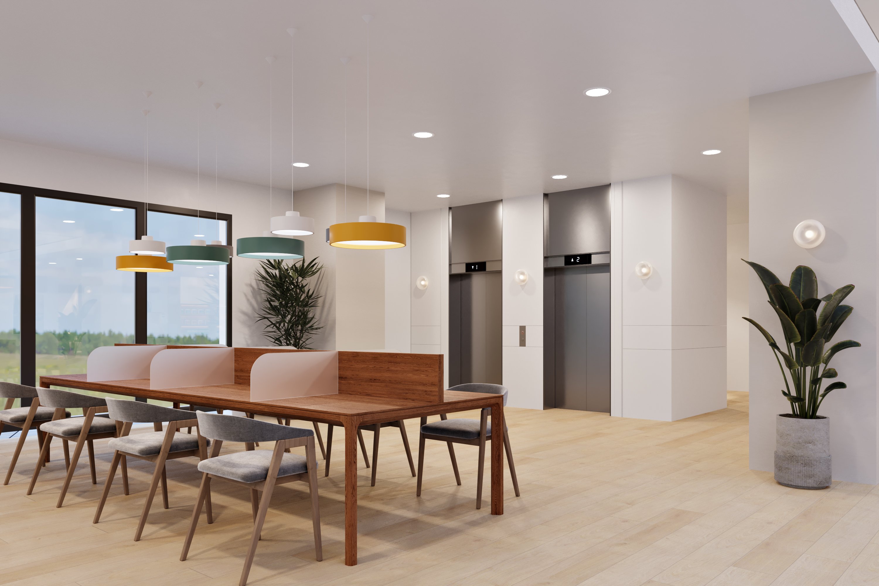 A shared work table near elevators with pale timber flooring and muted pendant lights