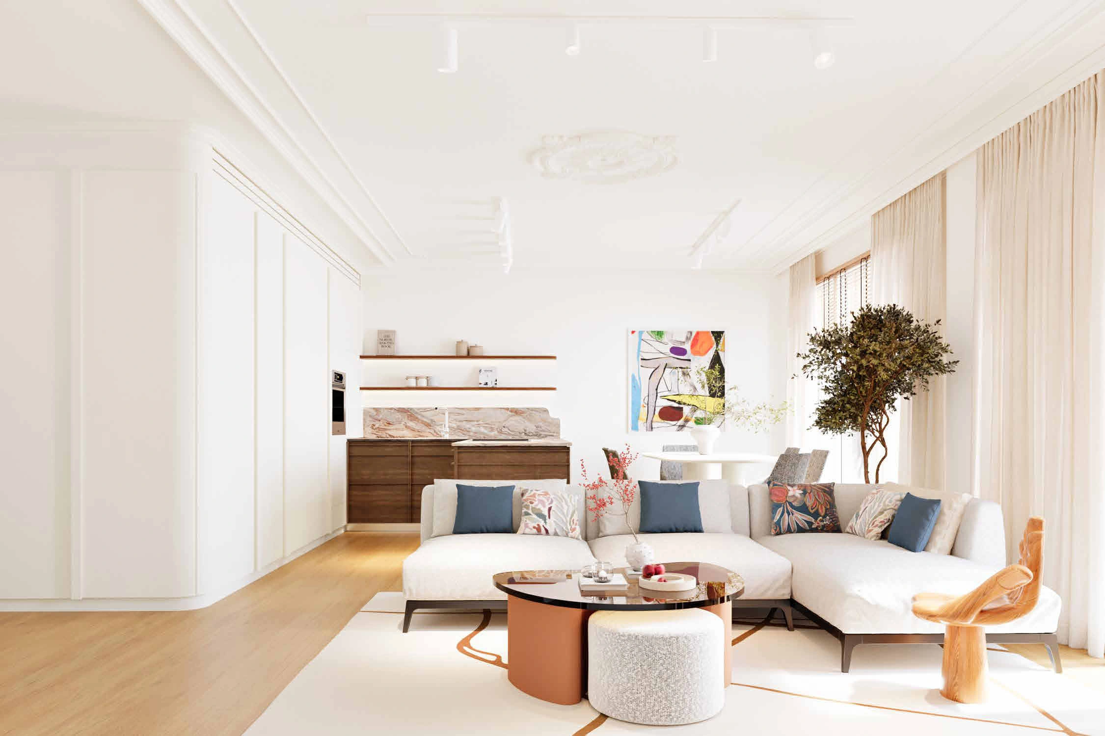 The open living area with a curved sofa and terracotta coffee table