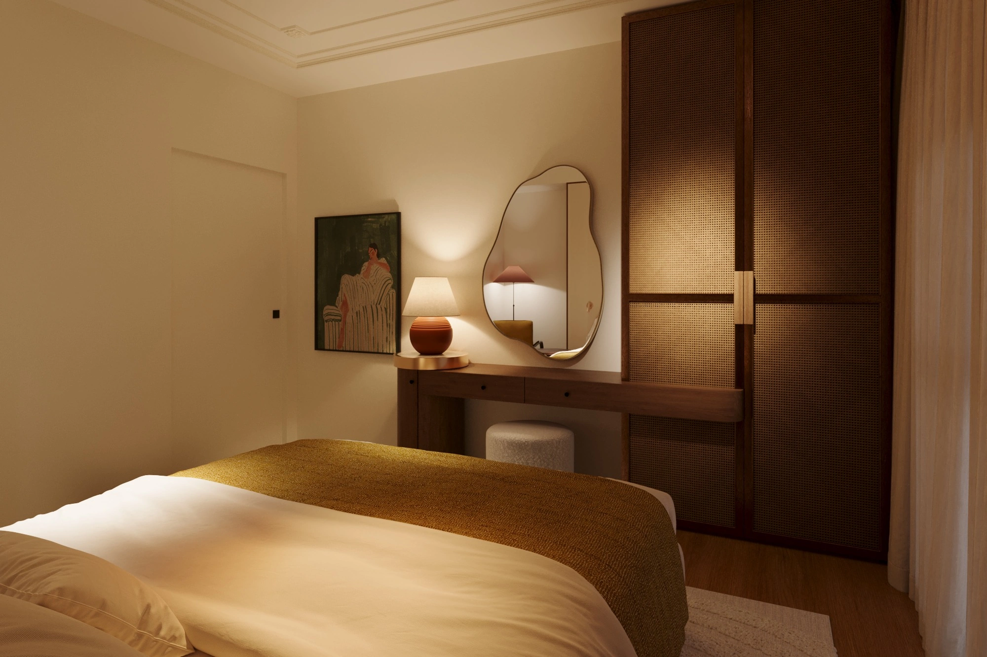 The walnut dressing table, sculptural mirror and raffia panels in evening light