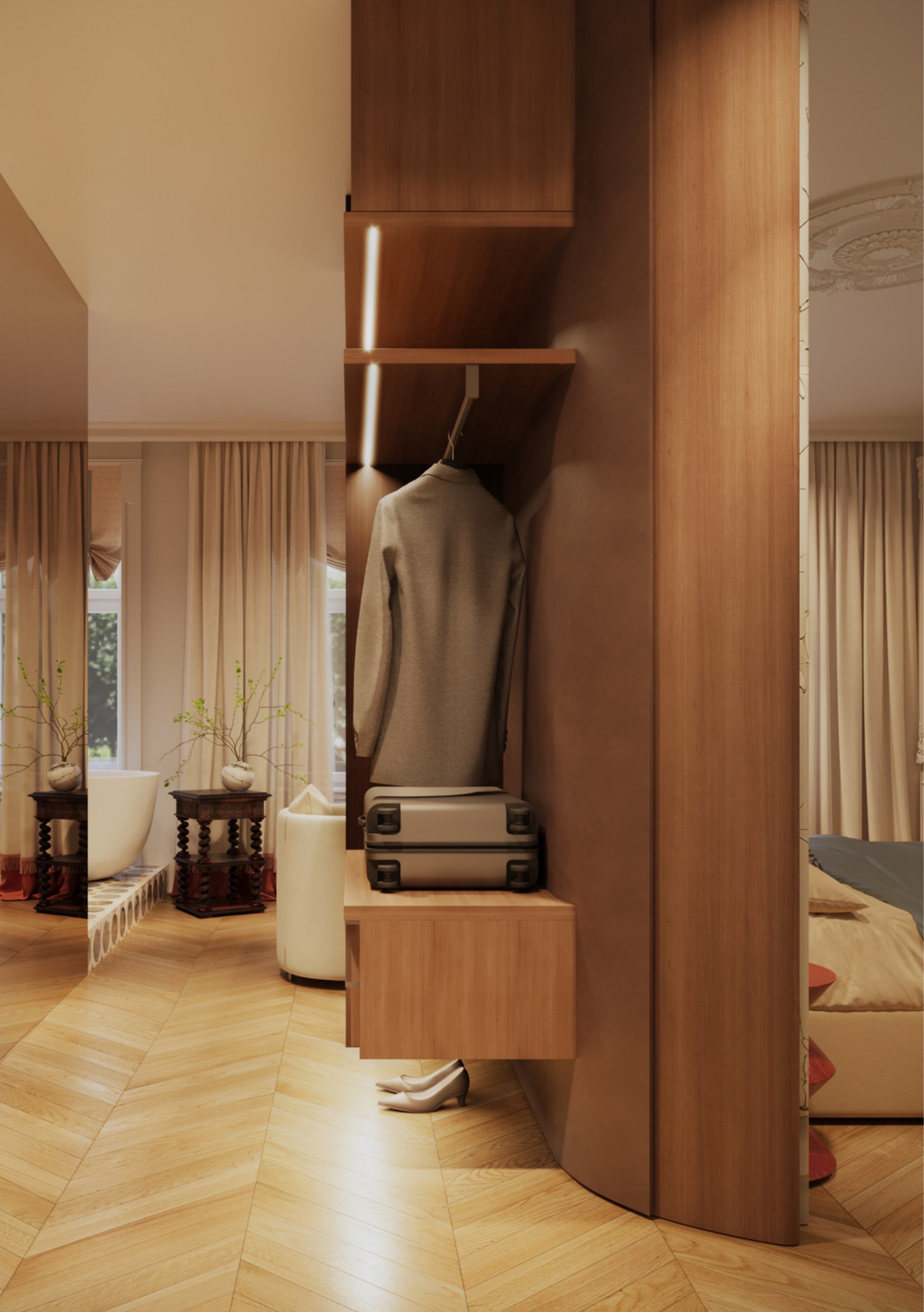 Integrated luggage and wardrobe storage beside the curved architectural element
