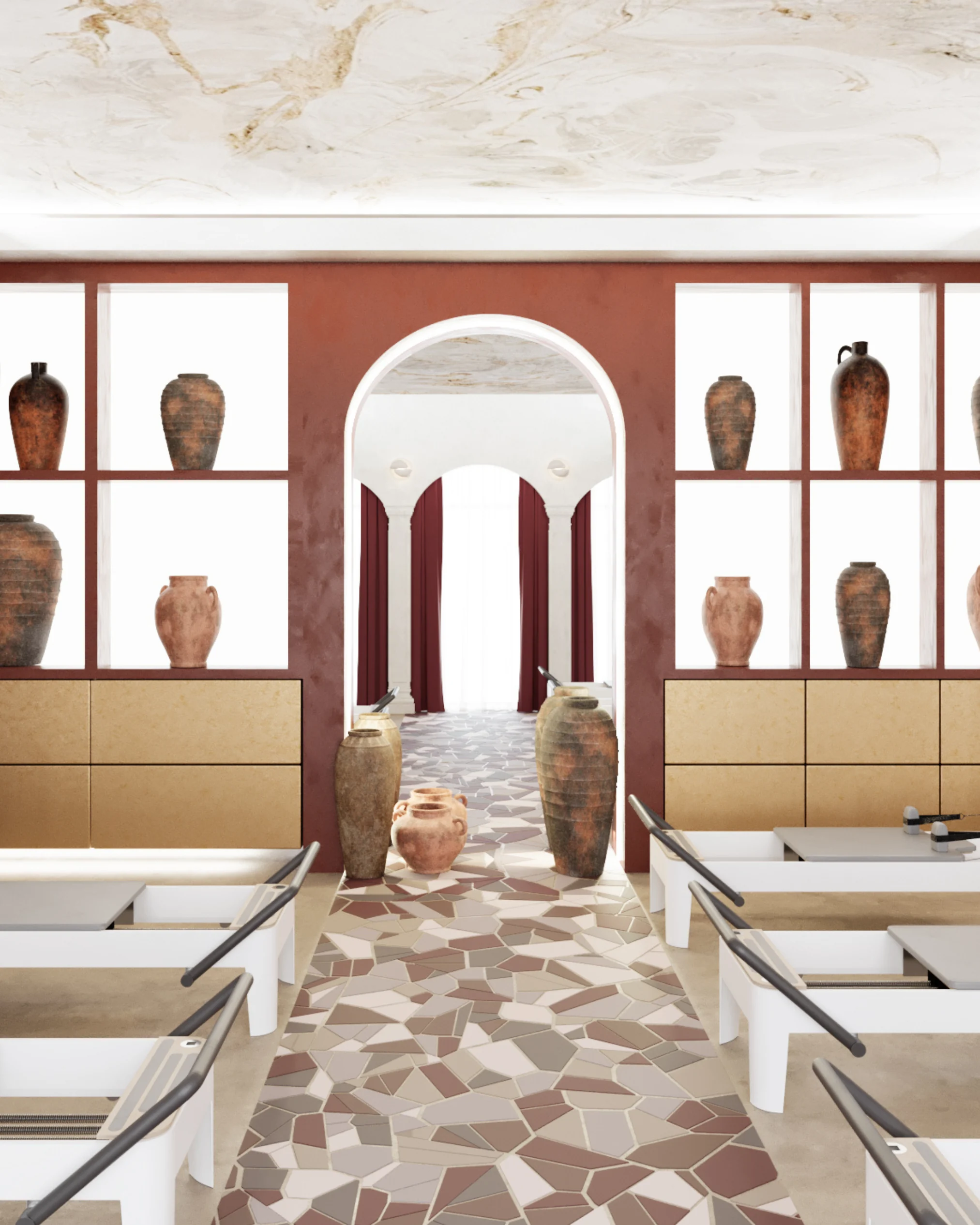 Arched opening toward a lighter training room with display niches and patterned broken tile flooring